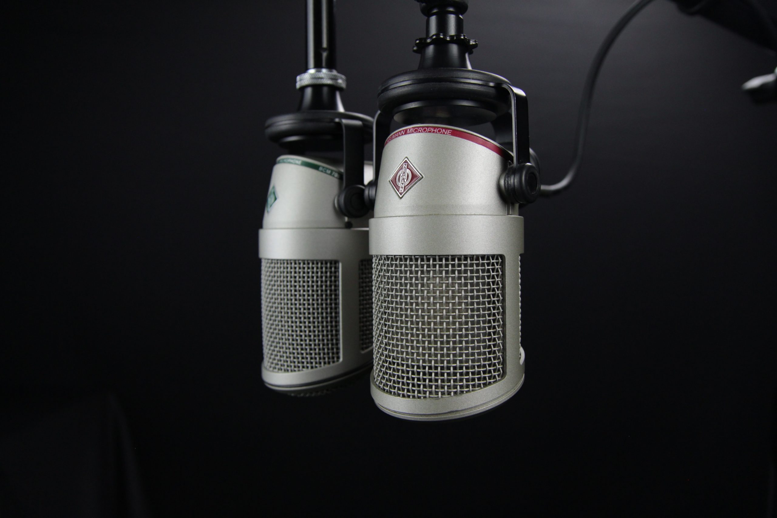 two microphones for a podcast